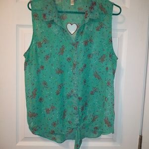 Sleeveless blouse with heart cutouts